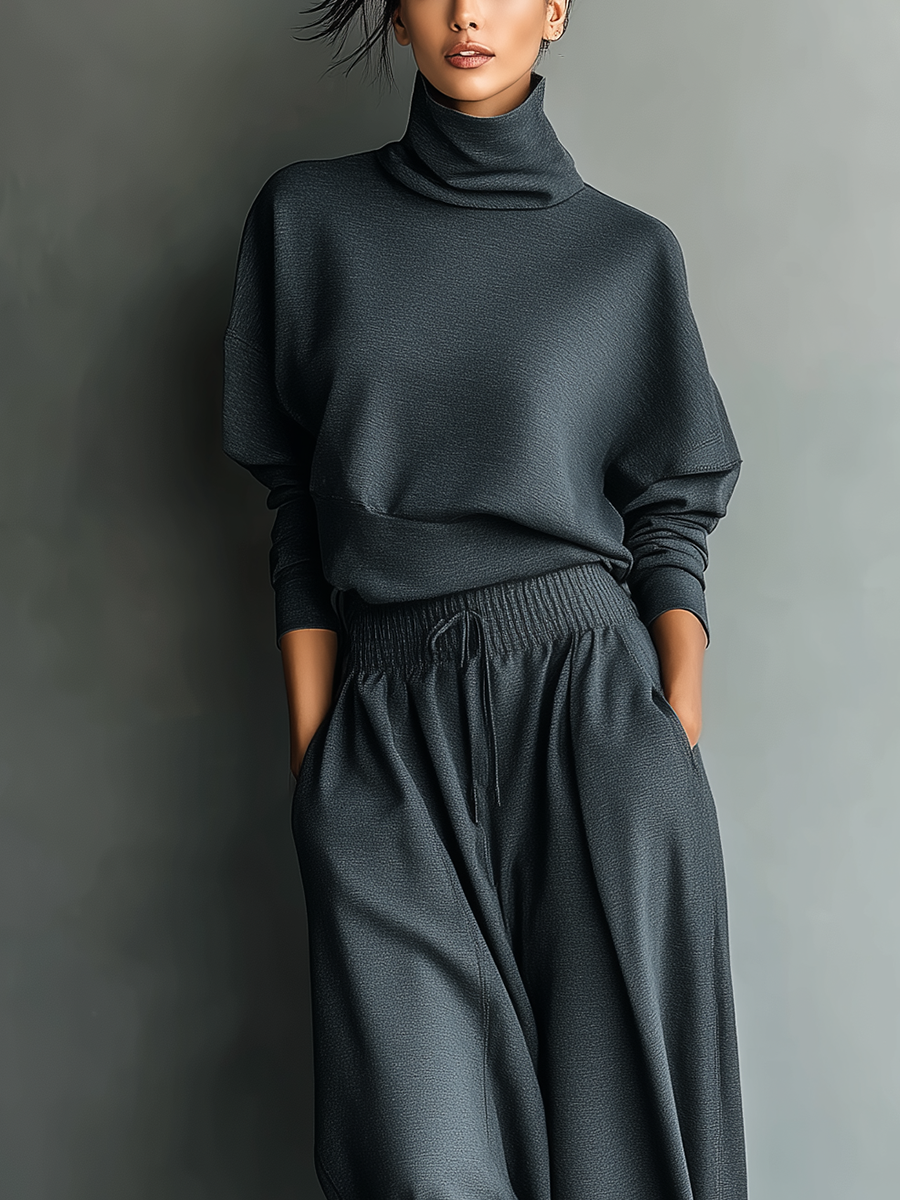Set da donna in maglia di carbone con collo alto e pantaloni a gamba larga