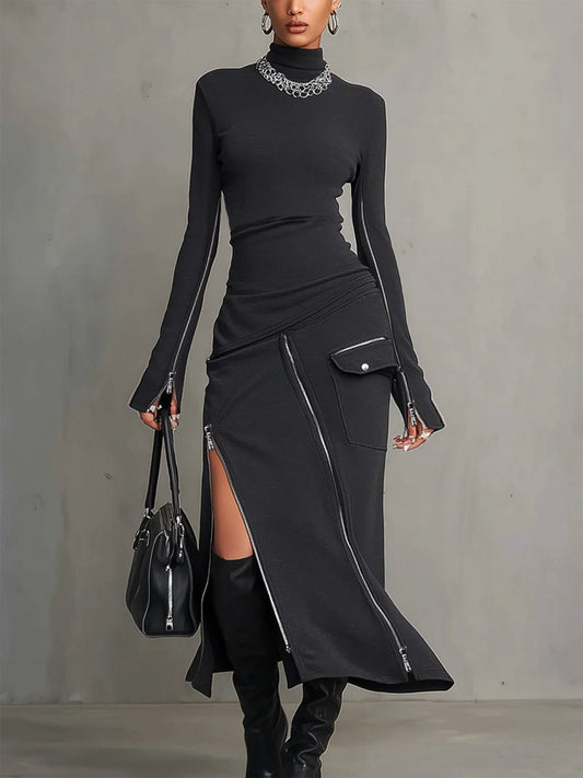 Completo con tasche zip irregolari e colletto alto