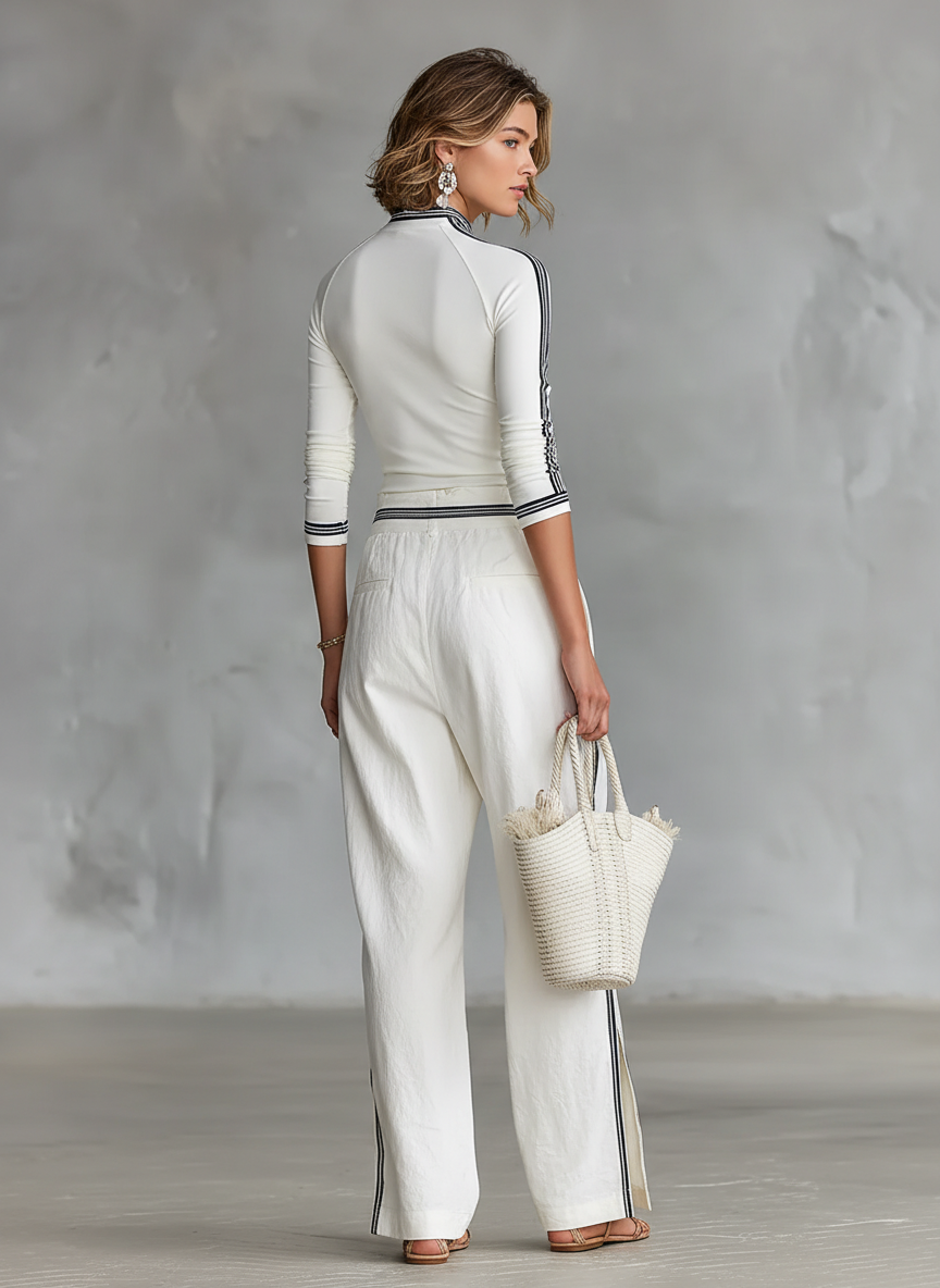 Set due pezzi da donna: T-shirt sportiva a maniche lunghe con collo mezzo alto e pantaloni larghi con cordino