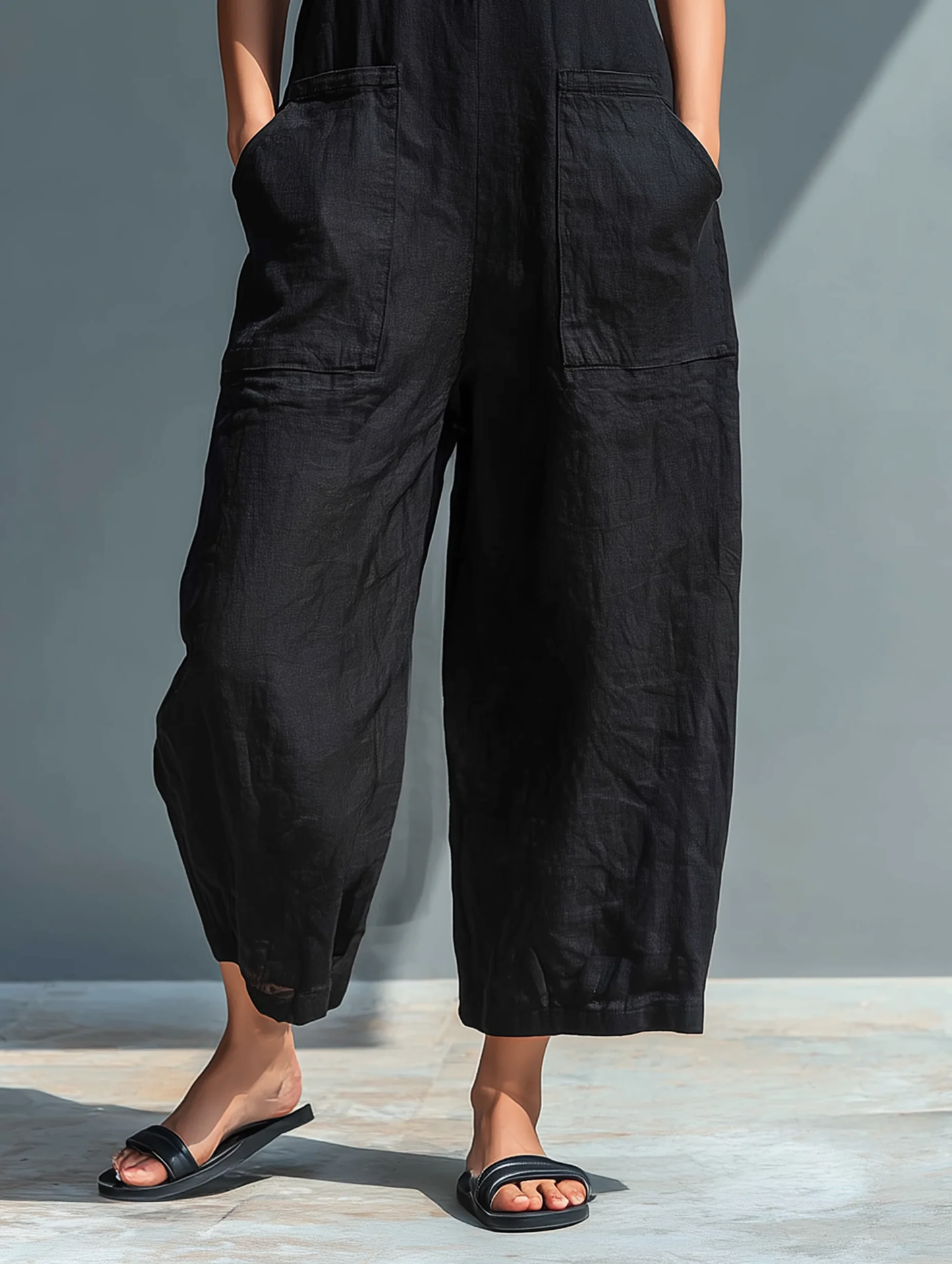 Tuta senza maniche casual in lino sintetico minimalista nera con colletto a bottoni
