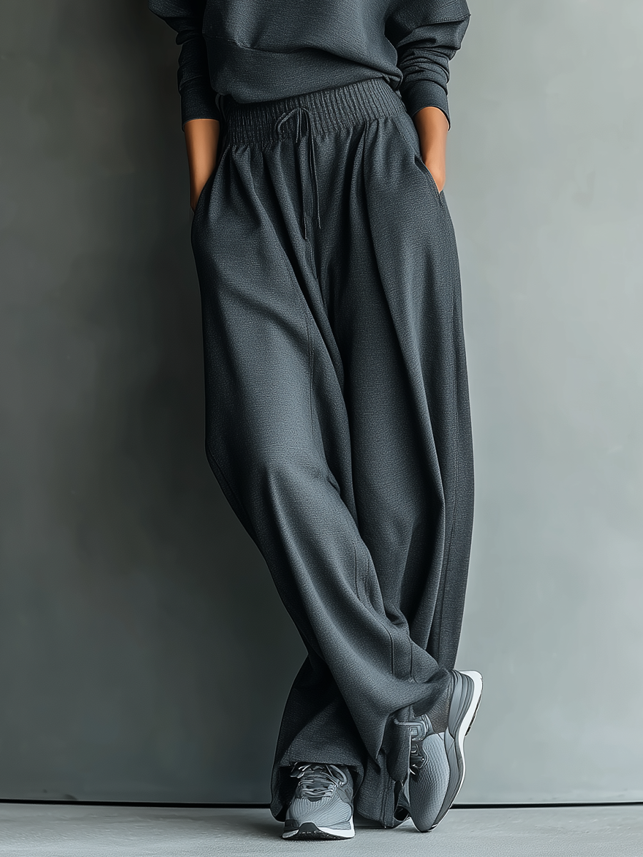 Set da donna in maglia di carbone con collo alto e pantaloni a gamba larga